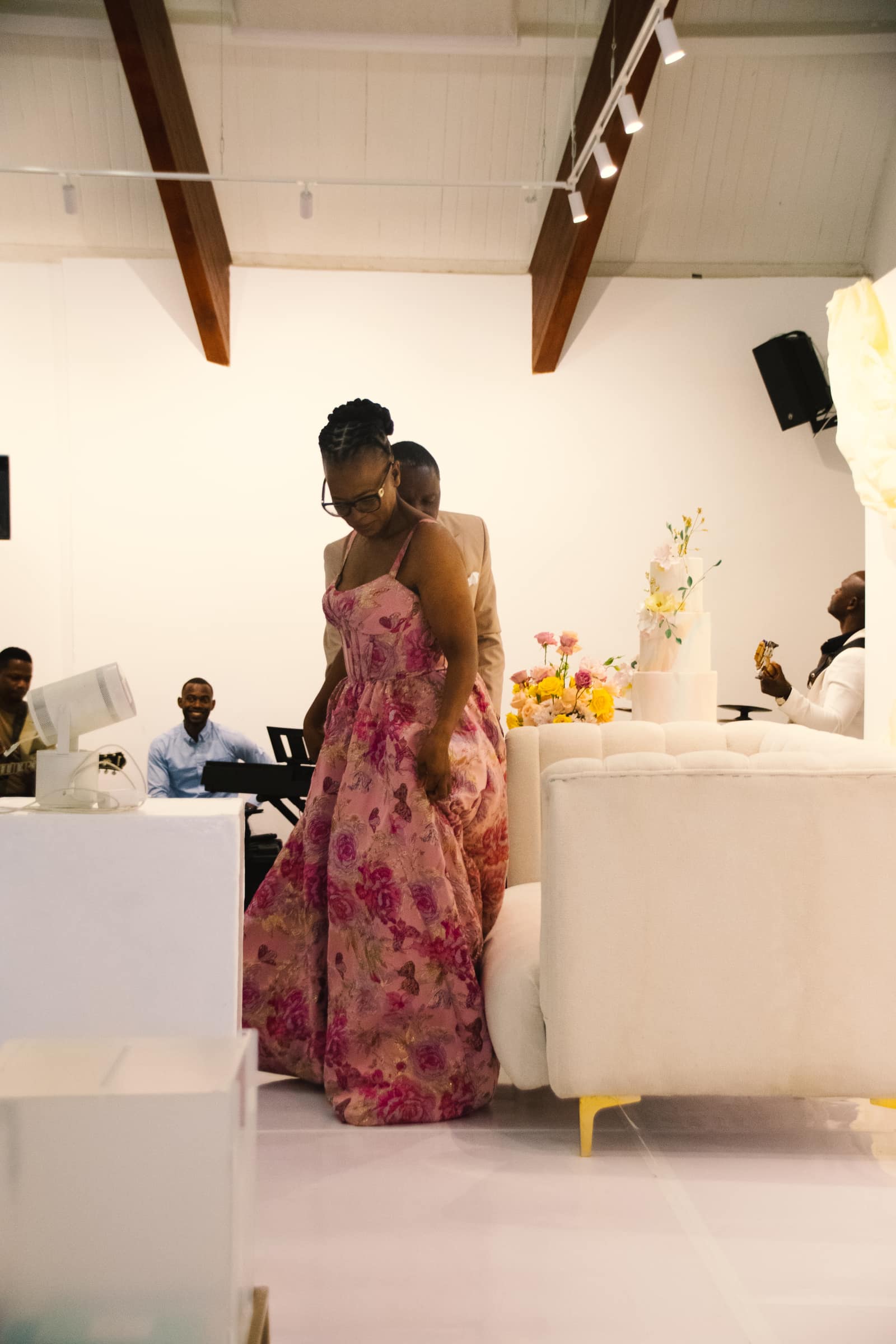 Candid event portrait under atmospheric lighting