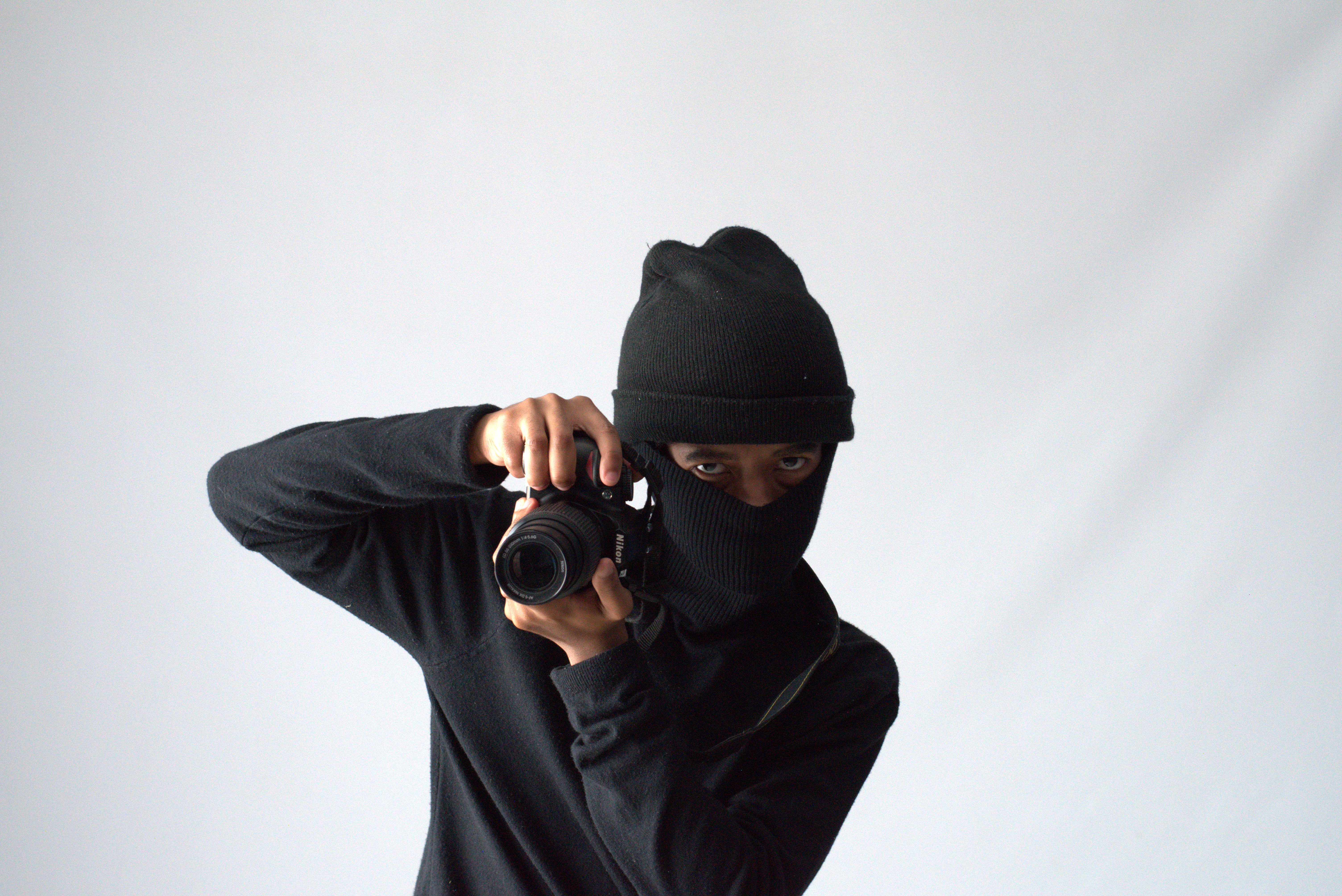 Studio portrait with warm lighting and polished creative direction